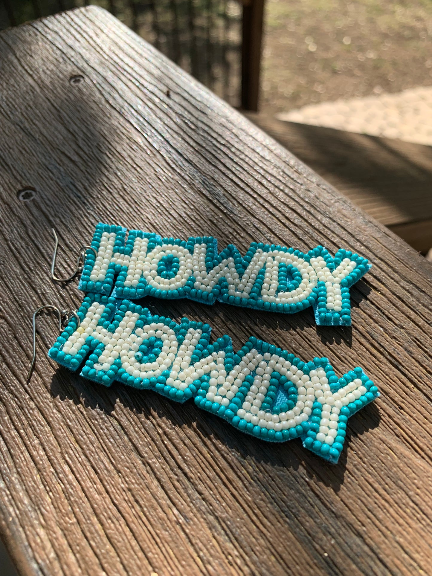 "HOWDY" WORD SEED BEADED EARRING