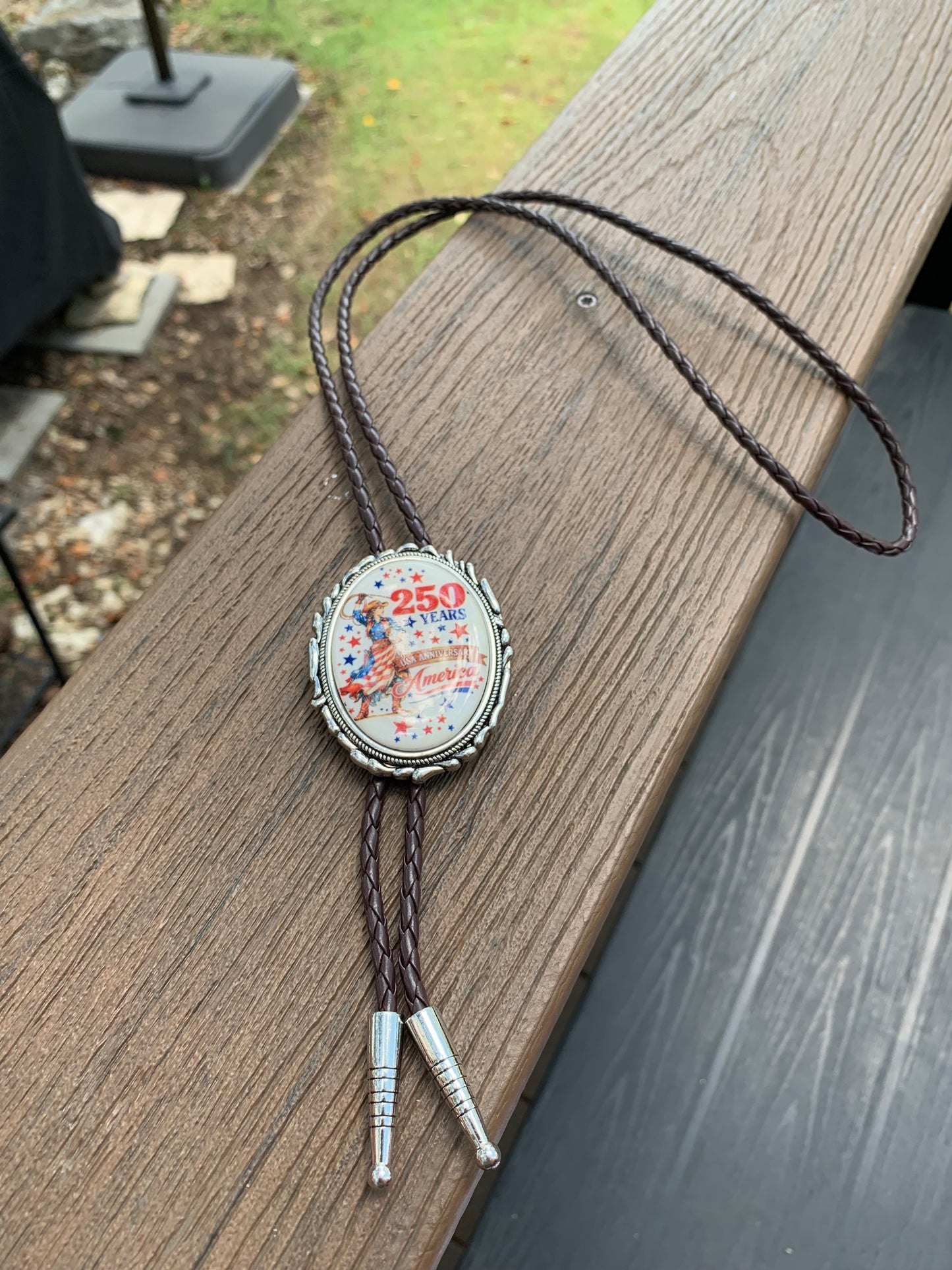 Brown leather with oval western 250 years pendent adjustable