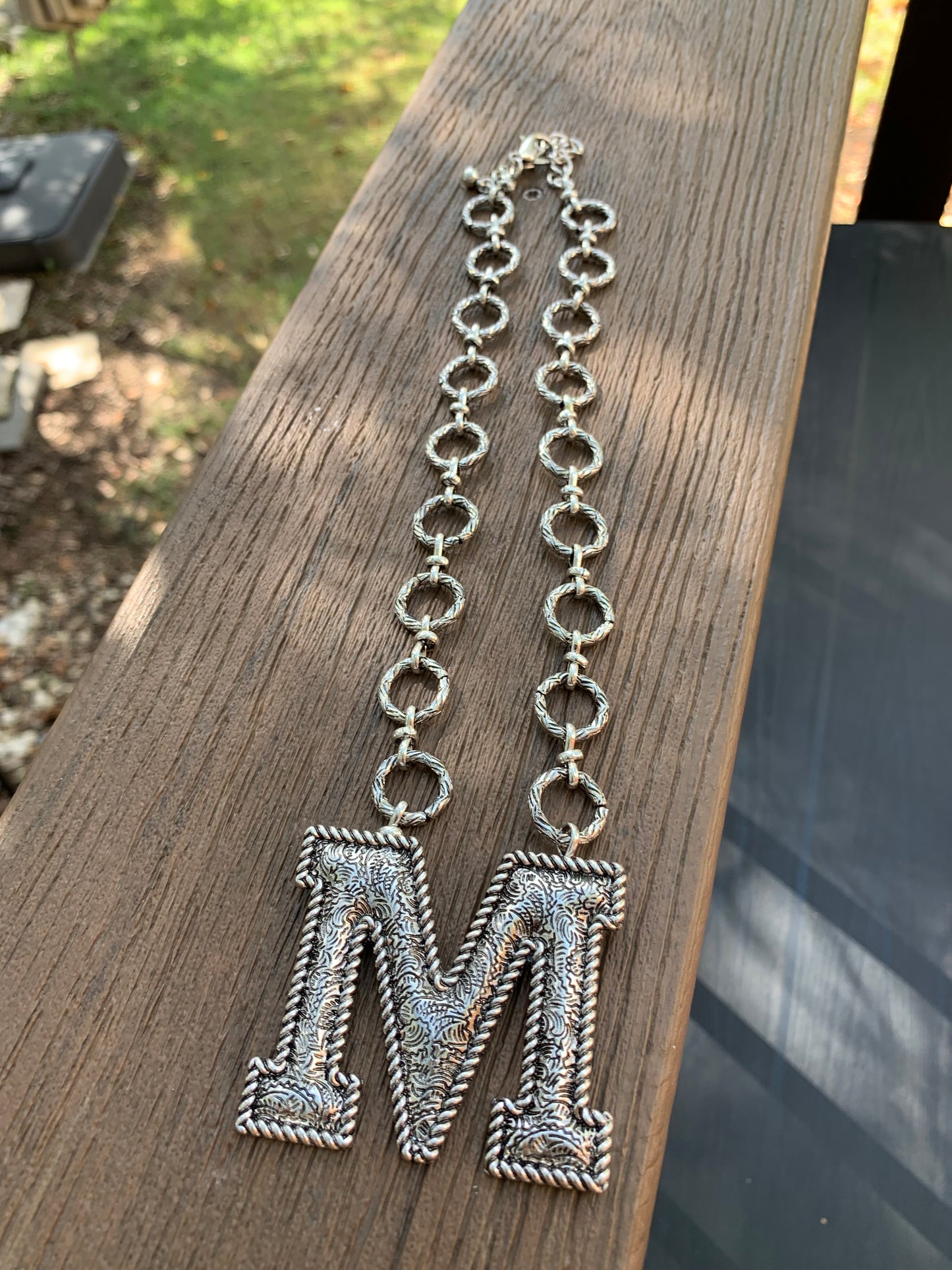 Initial necklaces