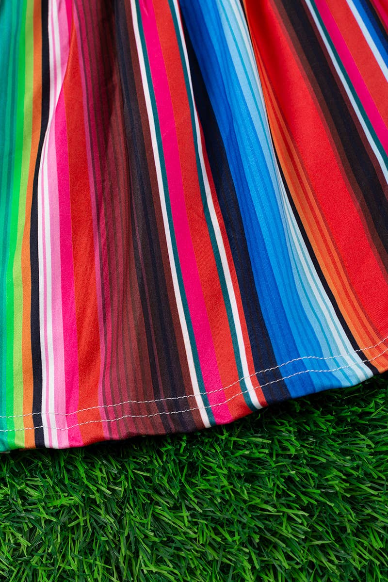 SERAPE PRINTED TUNIC WITH BLACK POM POM TRIM