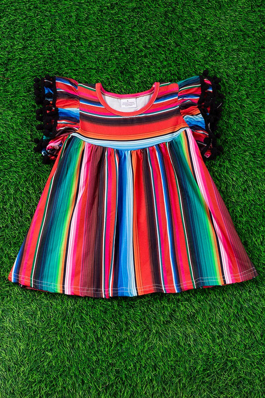 SERAPE PRINTED TUNIC WITH BLACK POM POM TRIM